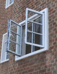 aluk residential systems showing white steel-look windows in flats