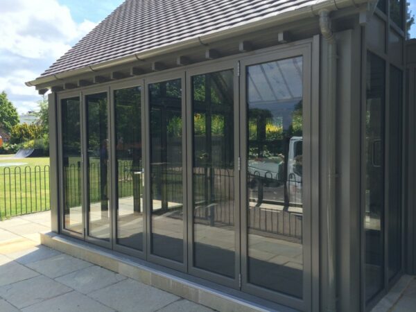 typical bifolding doors even when ultra slim still have visible meeting stiles and thicker sight lines.