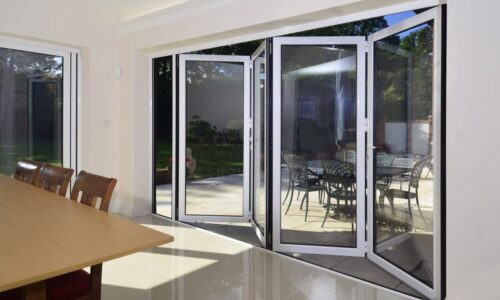 comar bifolding doors in white to new house extension.