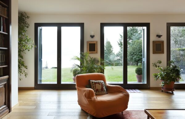 trade supply aluminium french doors with garden views and brown chair