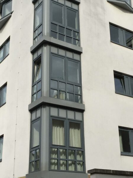 grey aluminium curtain walling in flats