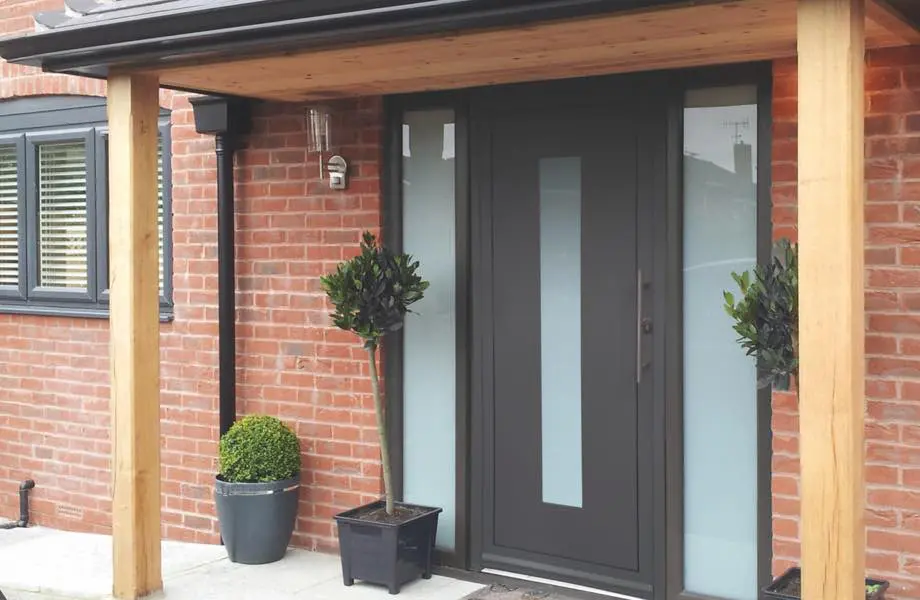 composite doors vs aluminium doors dark grey front door in a new-build home