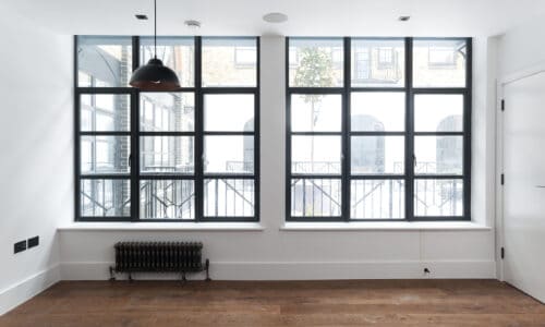 alitherm heritage windows in black fitted to london apartments replacing crittall windows with aluminium