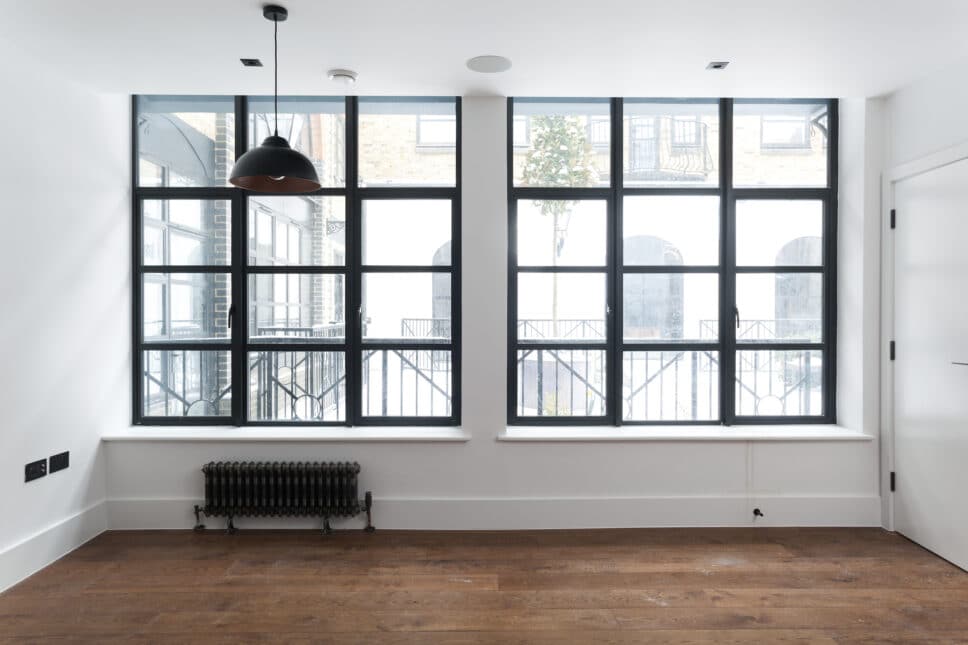 alitherm heritage windows in black fitted to london apartments replacing crittall windows with aluminium