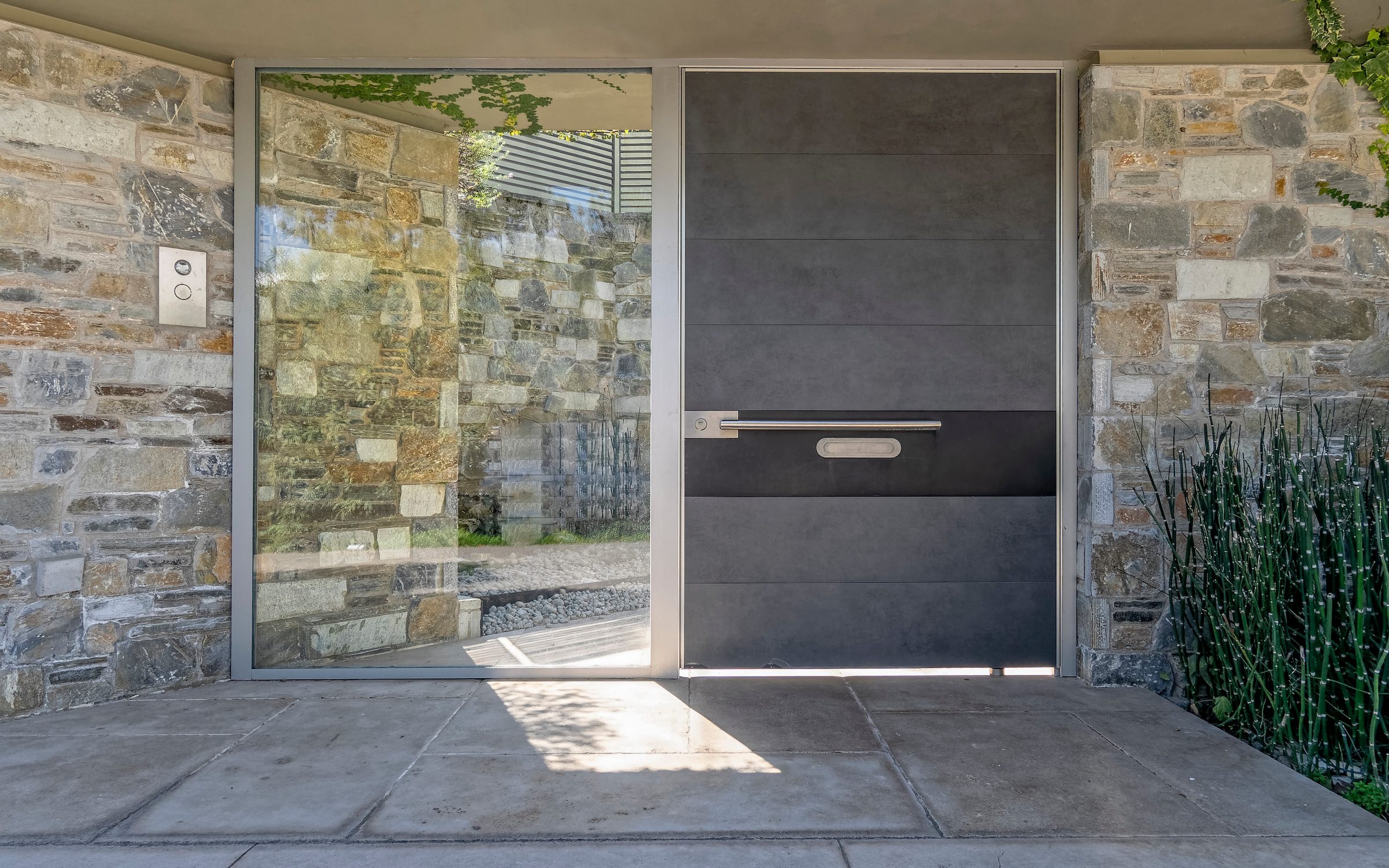 a new entrance door made from steel to a luxury house