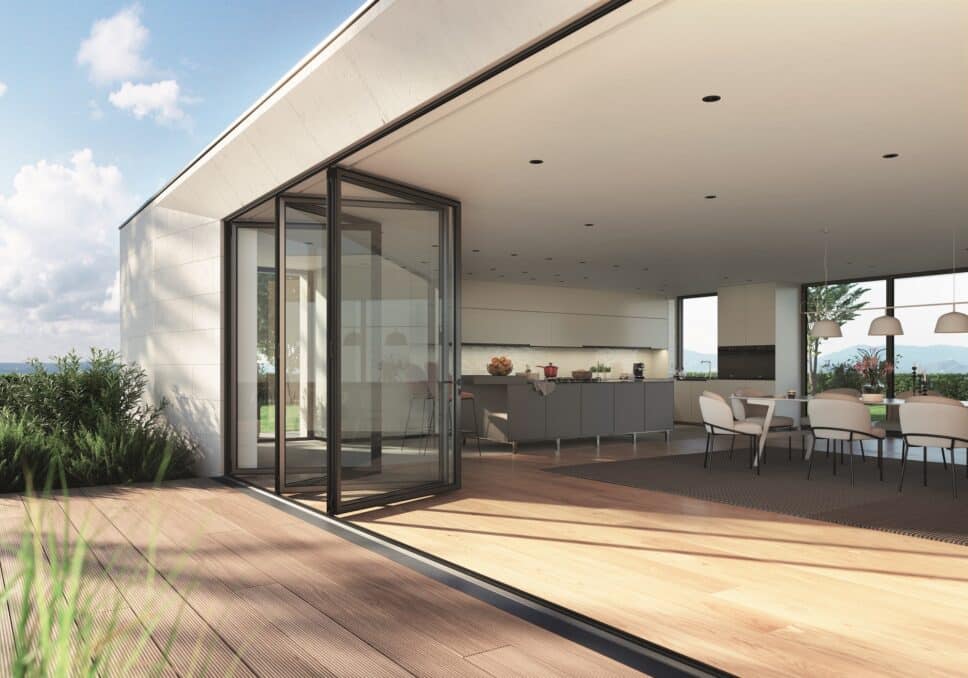 schüco as fd 75 bifold door outside view partially open with decking and wood flooring