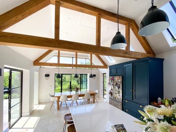 french doors in an oak beam room kitchen extension