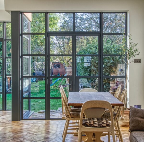 aluminium crittall-style doors in a new dining room extension supporting best windows and doors article. 