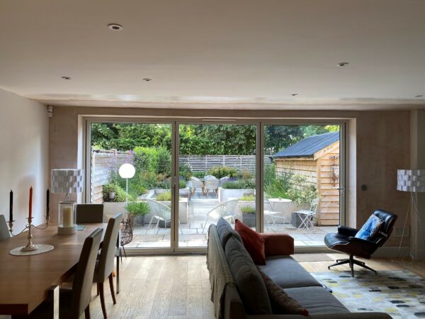 wide closed bifold doors in a dining room