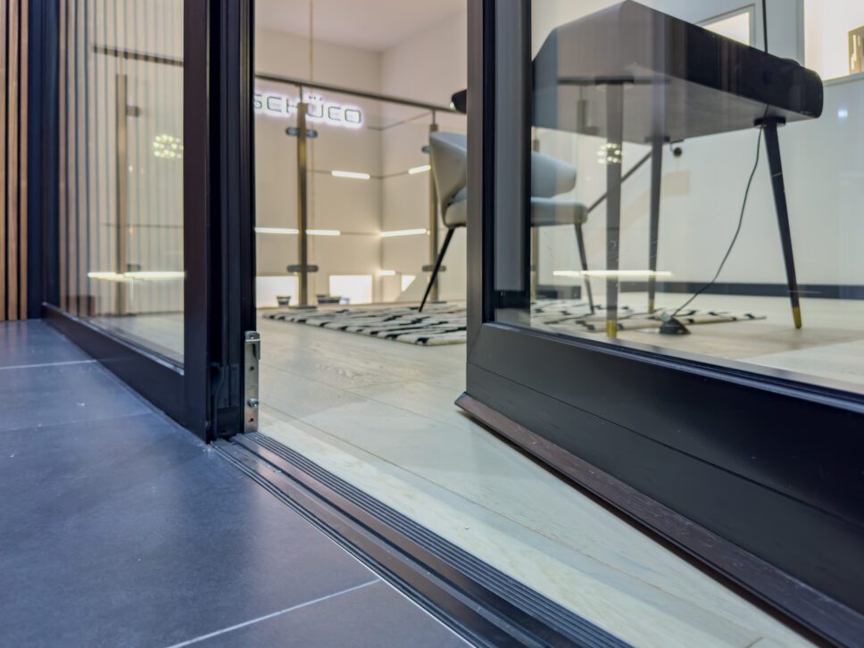 schüco barrier free doors showing flat floor and partially open door
