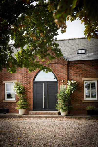 outside view of endurance composite front door, double design with gothic head