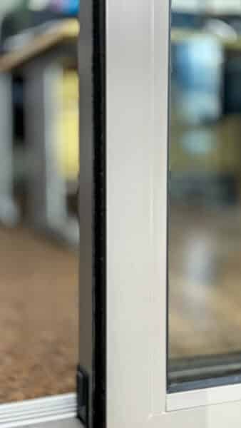 close up of cortizo cor vision sliding doors with flush stacking design