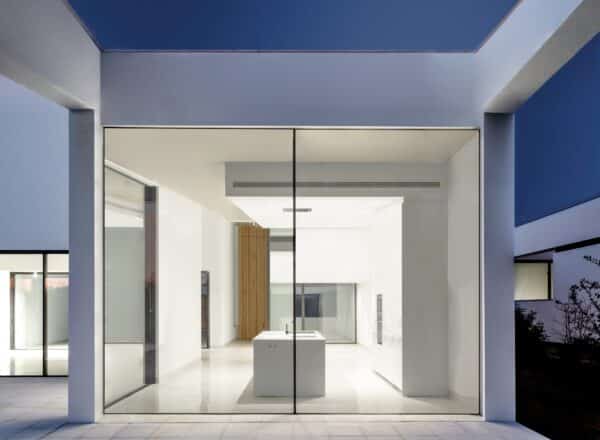 contemporary home at night with cvs20 sliding door