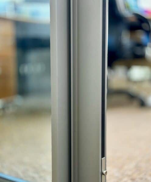 close up of door interlock with non-flush stacking design.