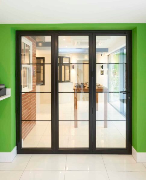 steel-look bifold doors in an essex window showroom